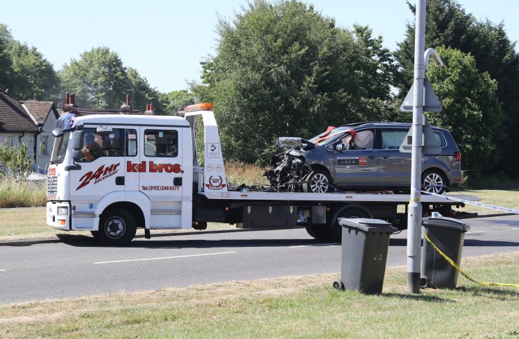 Copyright Ben Lack Photography Ltd The scene of a crash in Leeds that has cost the lives of 4 teenagers when a silver Seat hatchback crashed head on into an Uber taxi in the early hours of this morning. Words Mark Lister Pic Ben Lack +7970 850611 £150 minimum use, irrespective of any previous use. £50 for internet use, irrespective of any previous use.