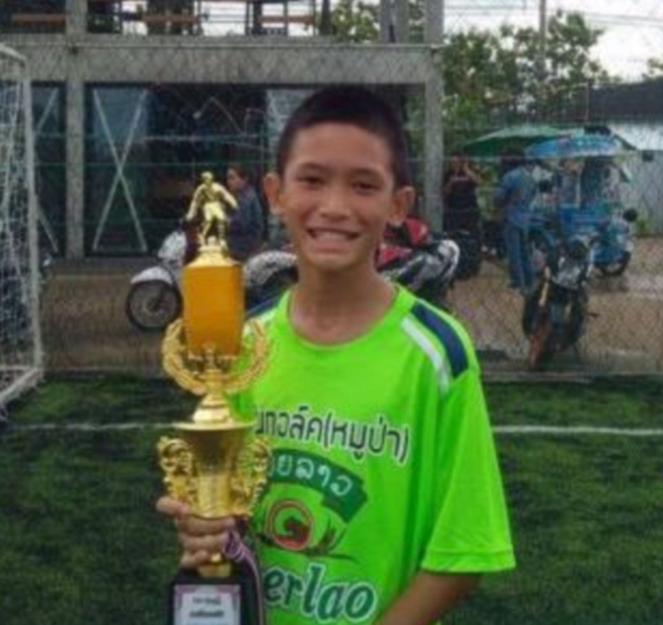 The first boy out was Monhkhol Boonpiam, 13, known as Mark. Eight other young players and their 25-year-old coach of the Wild Boars football team were chosen to remain in the cavern – half a mile deep – until tomorrow