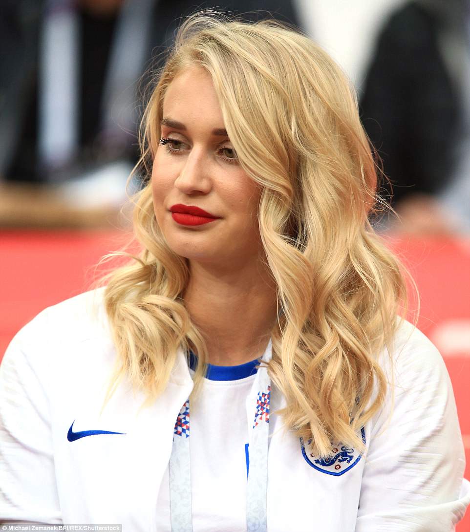 Jack Butland's partner Annabel Peyton appears nervous as she waits ahead of the game at the Moscow stadium where England face Colombia
