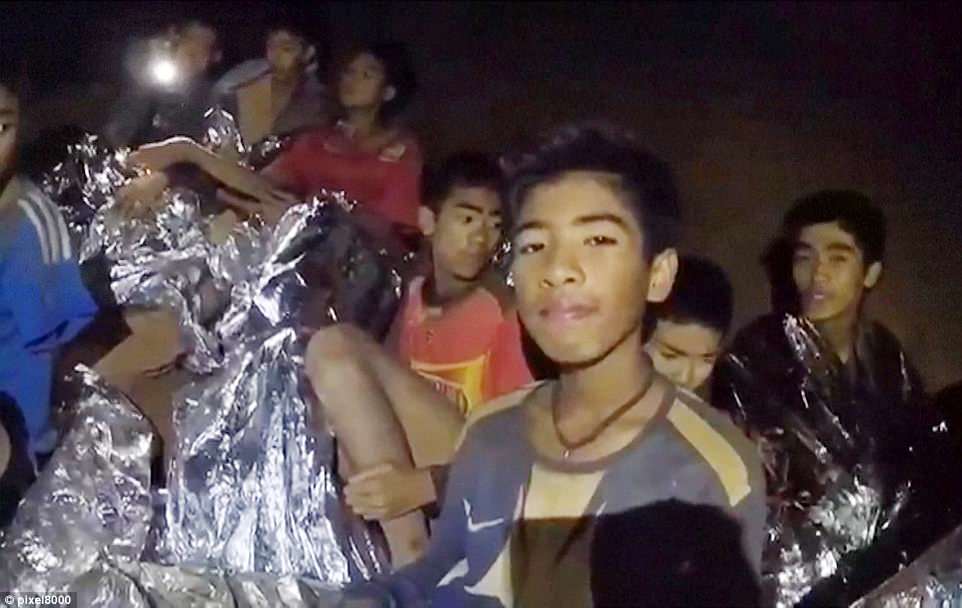Coming home: The evacuation of 12 schoolboys trapped in a flooded cave in Thailand has begun and they could be out by tonight, the rescue commander announced on Sunday morning 